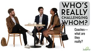 Who’s Really Challenging Whom? Three persons sits in a cafe looking confused, discussing. Coaches what are they really?.